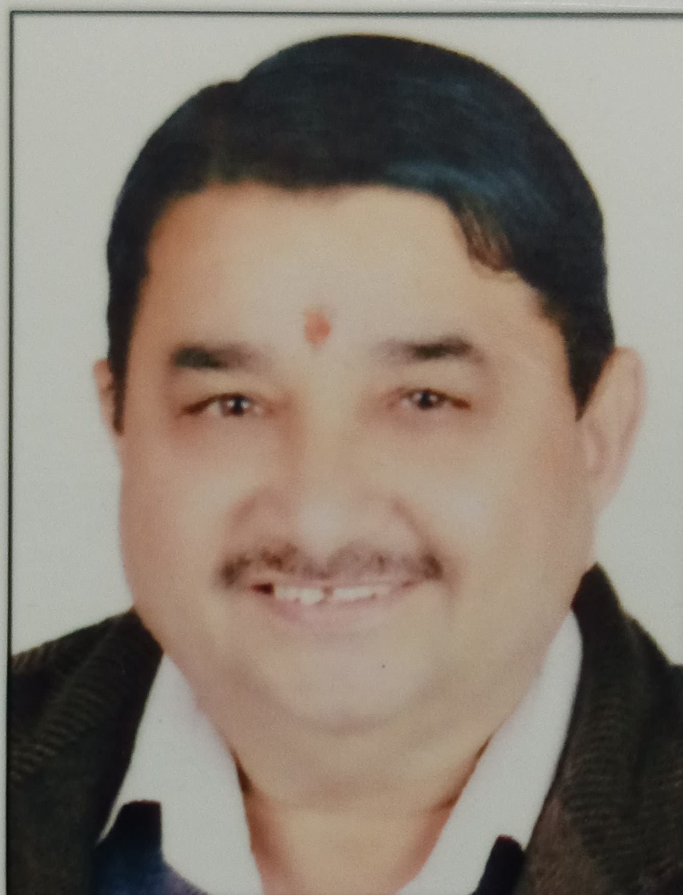 Shri Umesh Sharma Kau